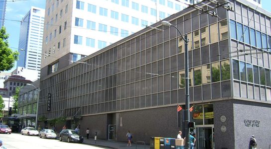A modern office building on a city street.