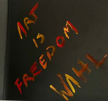 closeup of a banner saying Art is Freedom