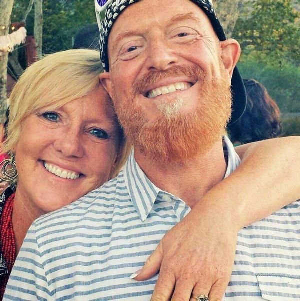 closeup shot of a man and woman smiling 
