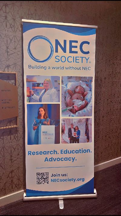 Banner for NEC Society promoting research and advocacy.