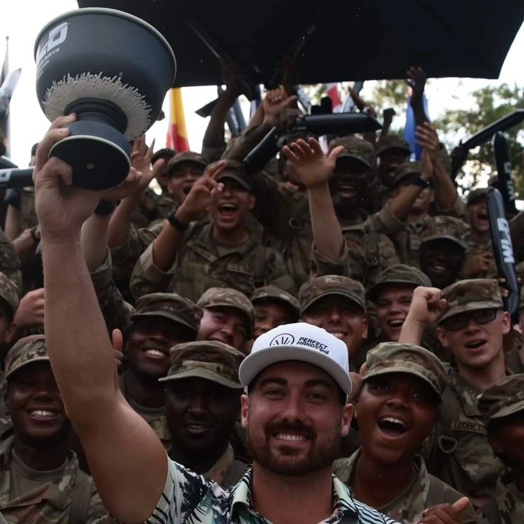 colton casto with soldiers at Fort Jackson