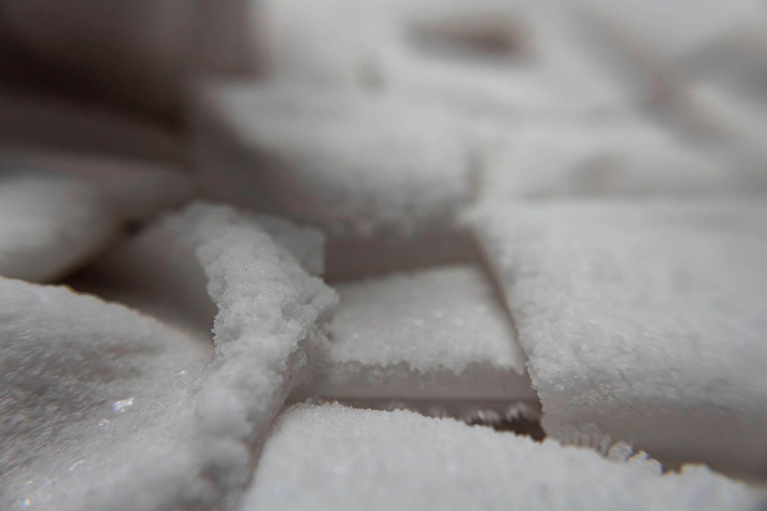 Photograph of salt-encrusted woven white fabric