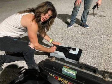 Jake Curtis Allard signing a fog machine for fans in Fort Worth Texas Ridglea Theater Room Club