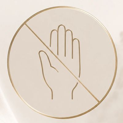 Verbotsschild mit Hand-Symbol und diagonaler Linie.