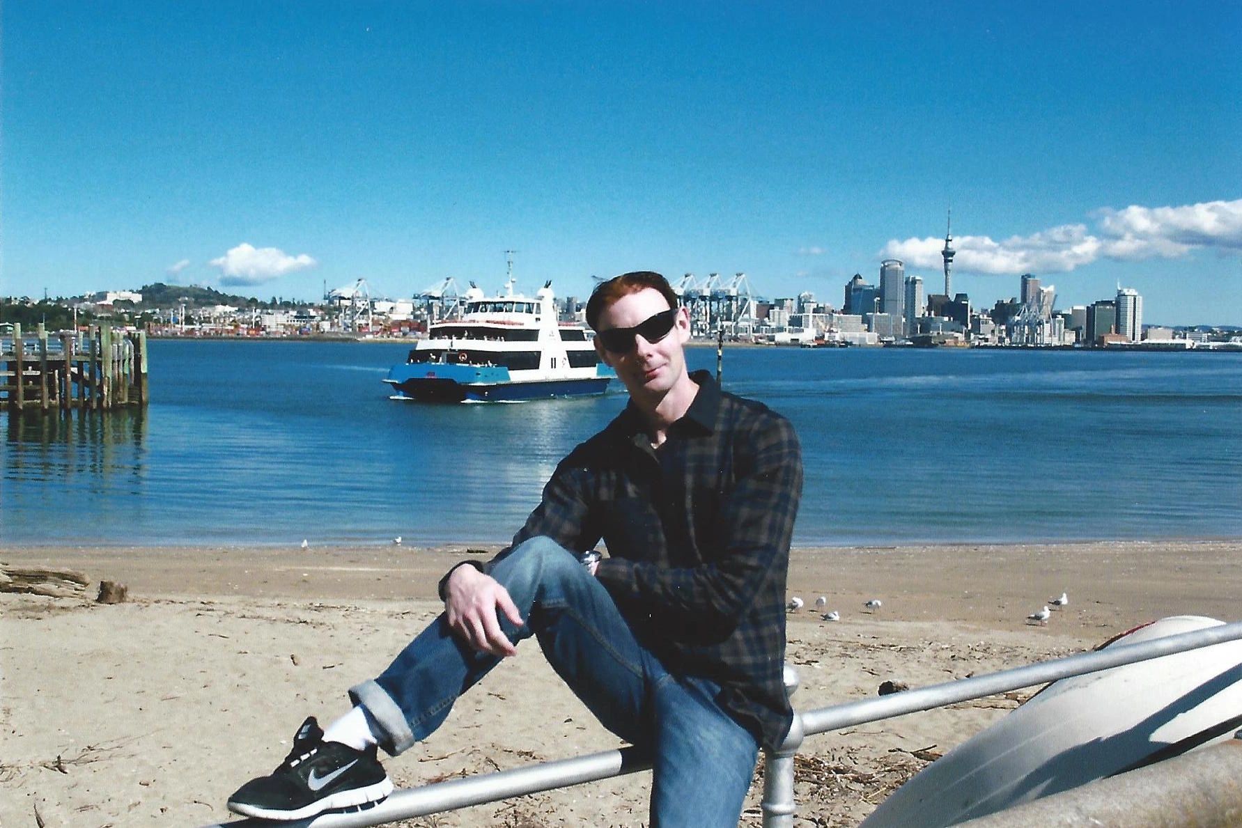 Phillip in Devonport with Auckland CBD in the background.