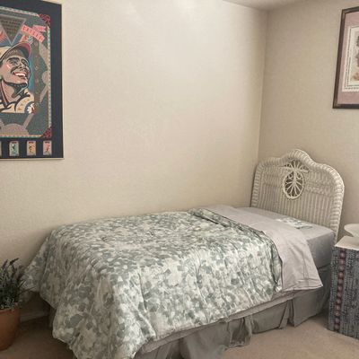 A picture of a bedroom at Tranquillity Senior Living.