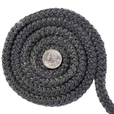 Coiled black braided rope with a quarter on top.