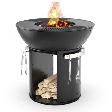 Modern black fire pit with wood storage and grilling tools.