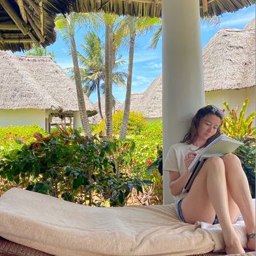 Sydney (VSWS Founder) journaling in Zanzibar