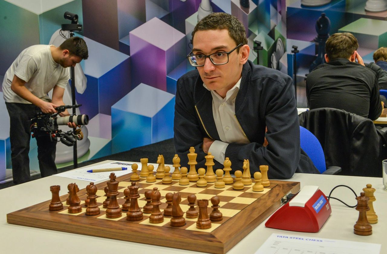 Tata Steel Chess 2022: Magnus Carlsen beats Fabiano Caruana to clinch title  with a round to spare