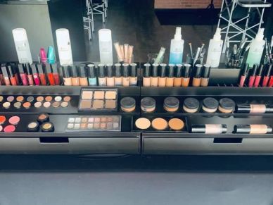 Makeup products displayed in an organized manner.