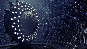 Sci-fi room with a circular device and lights.