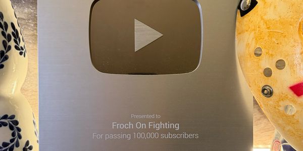 YouTube Silver Play Button for 100,000 subscribers.
