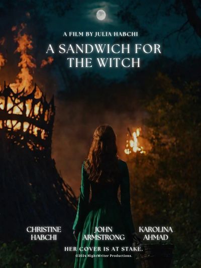 A mysterious woman in a dark forest with burning structures, film titled 'A Sandwich for the Witch'.