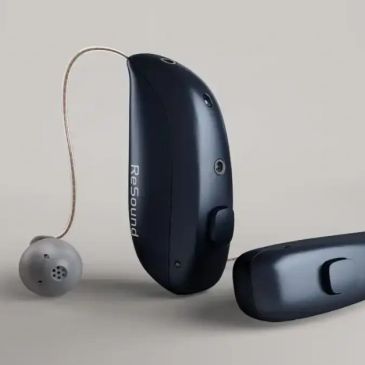 Close-up of a ReSound hearing aid device.