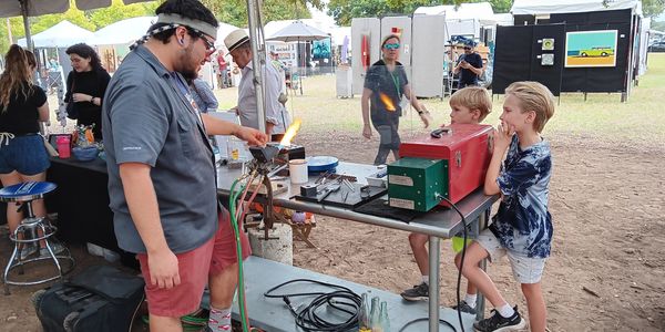 SinNaCa's Nick Gomez demonstrates glassblowing