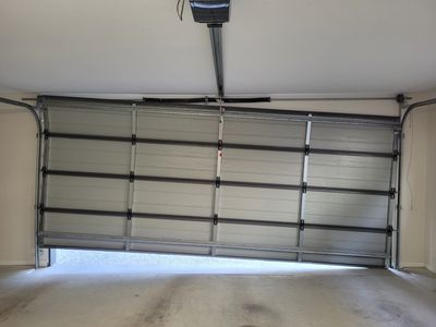A lopsided garage door