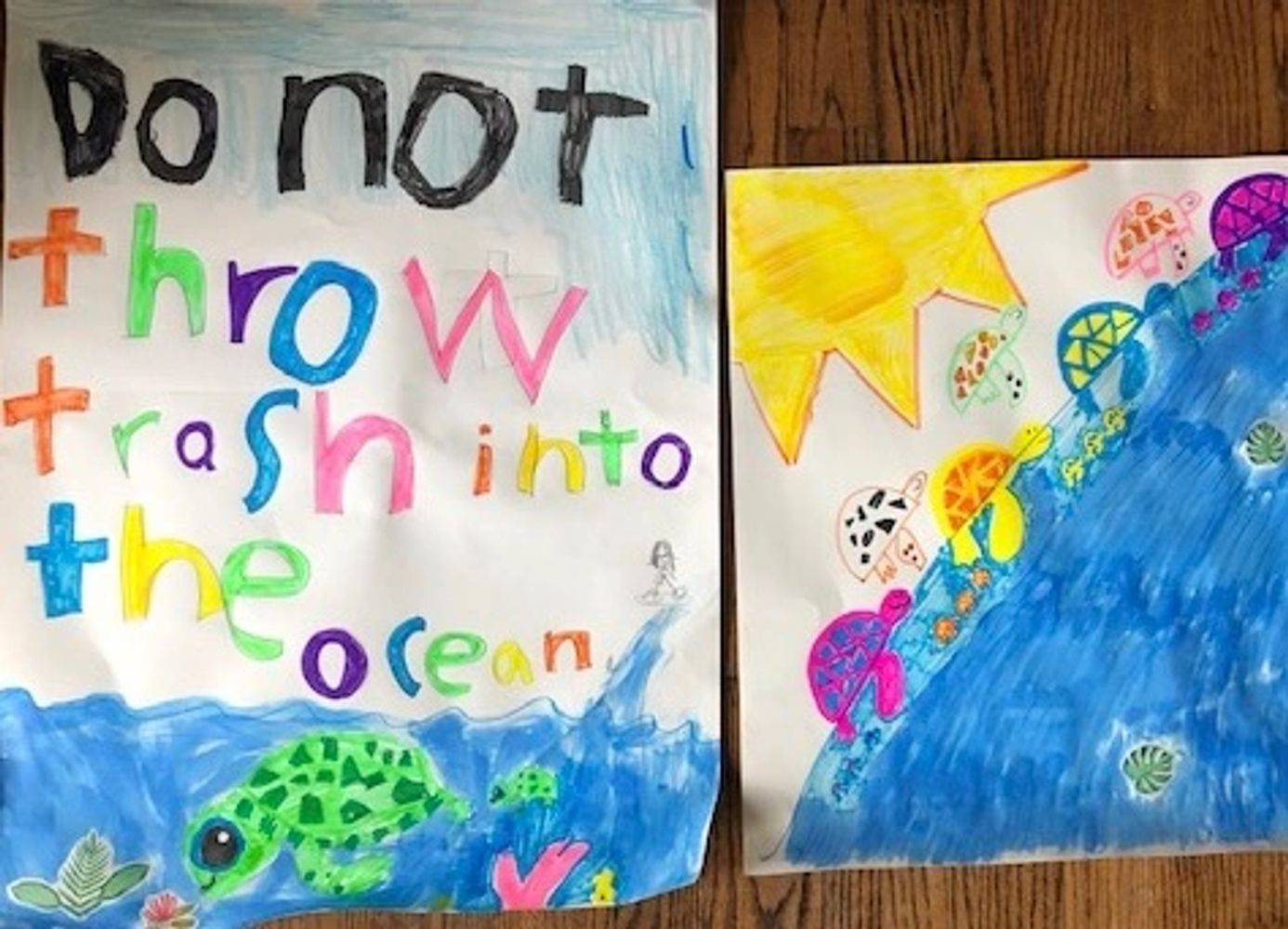 Kids drawing of sea turtles, out of concern for plastic waste in the ocean
