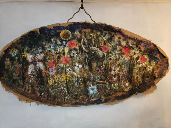 Abstract, colorful painting on a rustic wooden slab with animal and floral motifs.