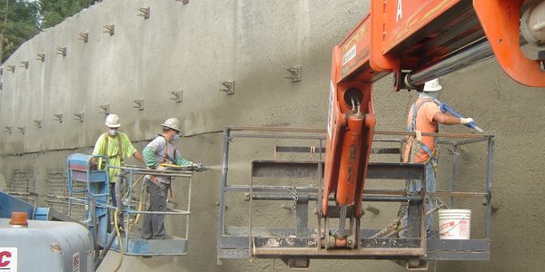 Permanent soil nail wall faced with shotcrete at ASMSA school in Hot Springs, Arkansas.