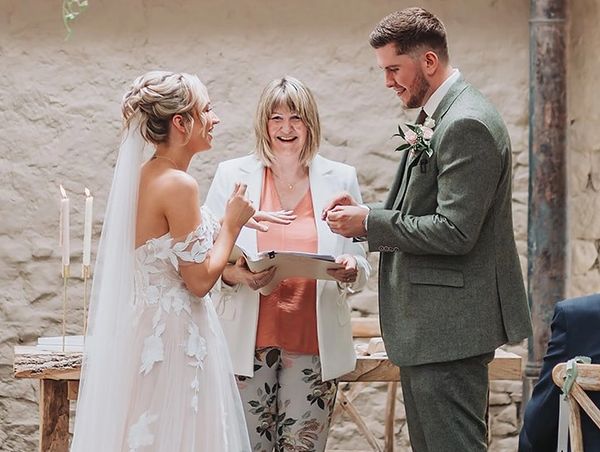 Couple exchanging rings in a ceremony with Amanda Leeson Celebrant.
Image Claire Basiuk Photography 