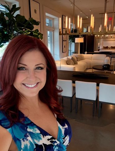 Sandy Kastel in a modern Las Vegas kitchen, showcasing elegent interior design and lighting details.