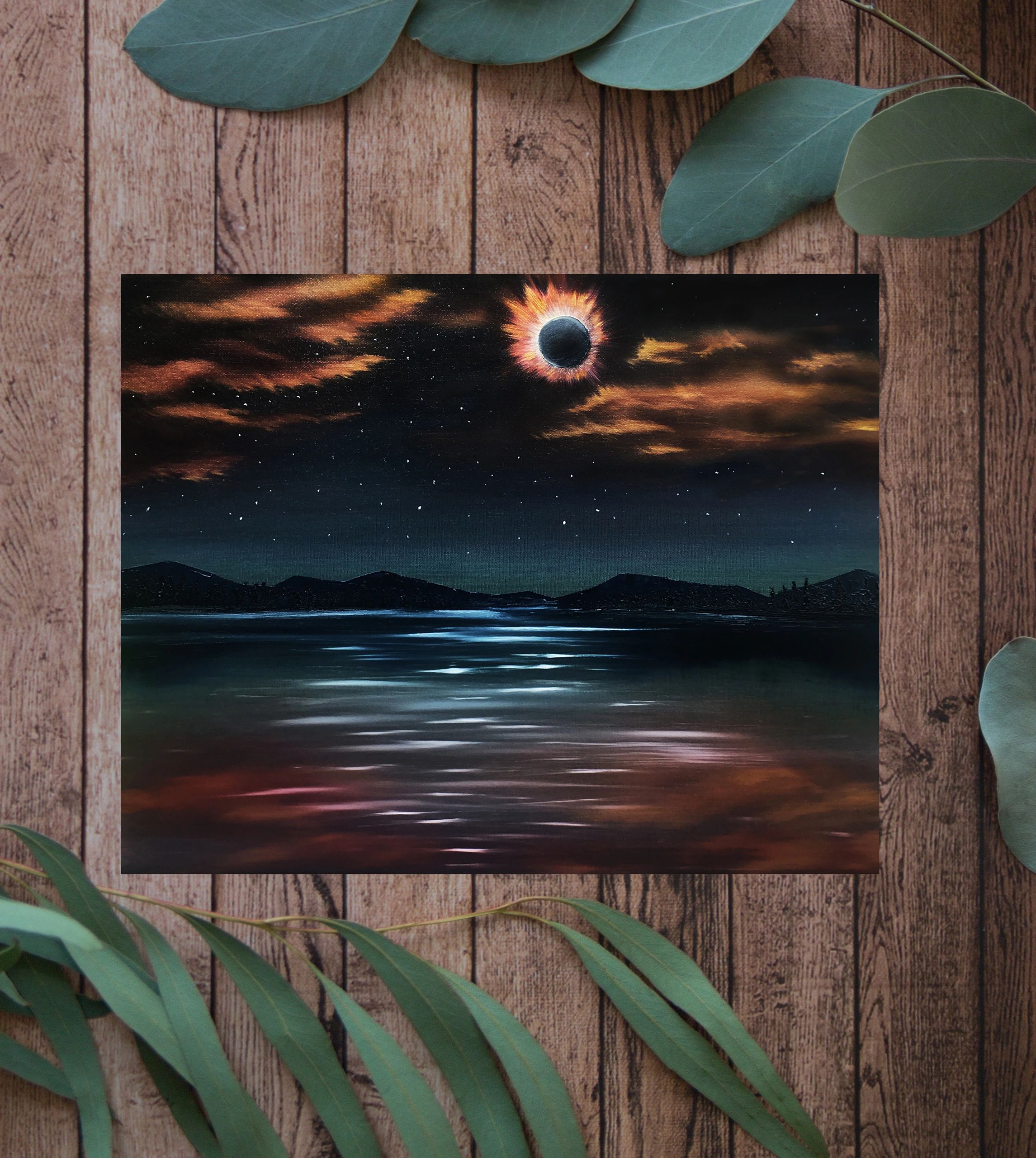 Solar Eclipse on the Lake Greeting Card on a Wood Background 