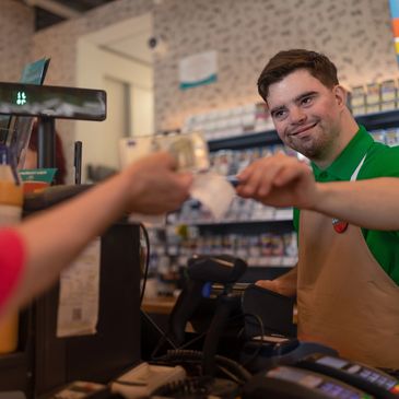 Retail Management Inc Cashier smiling