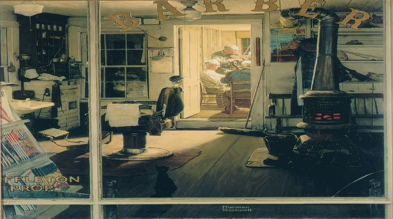 Interior of a vintage barber shop with a barber cutting a man's hair, featuring old-fashioned decor and a wood stove. A black cat sits on the floor by the entrance.