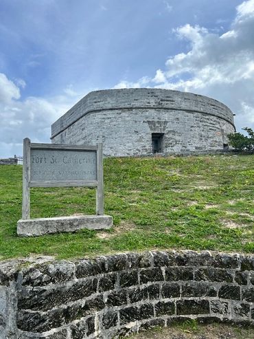 Fort St. Catherine, a historic stone fort under a cloudy sky.