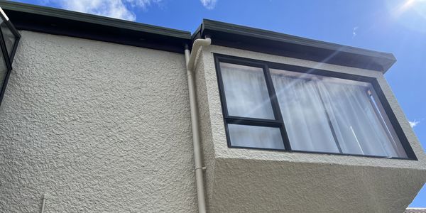 Freshly painted and cleaned stucco exterior.