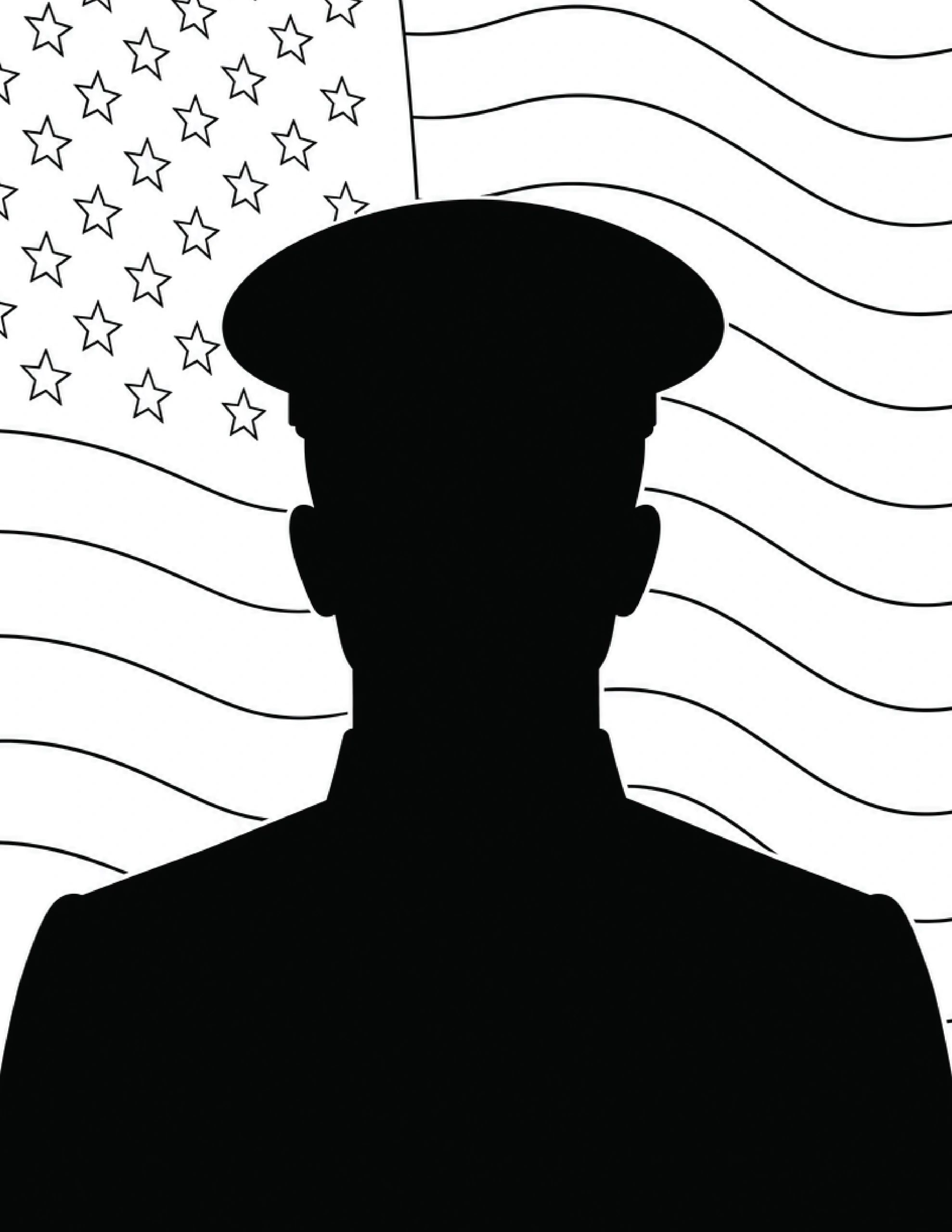 Silhouette of a soldier in front of an American flag.