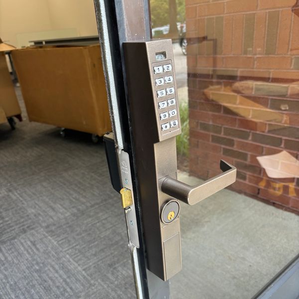Storefroot door lock. Adams rite Trilogy lock set.  Locksmith service in Durham NC. Creedmoor NC