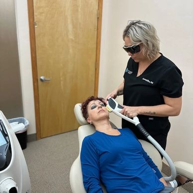 A Woman Getting Skin Treatment From a Professional