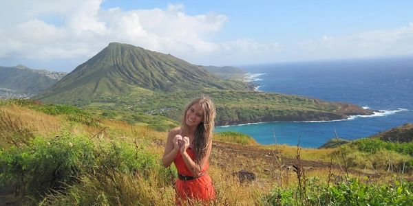 Blonde girl who loves traveling to beautiful tropical beaches and countries