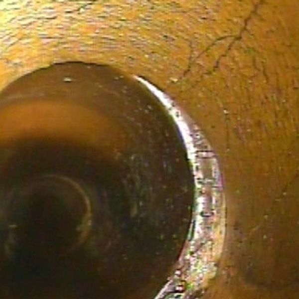 CCTV drain survey showing a displaced joint and cracking in clay drainage pipework