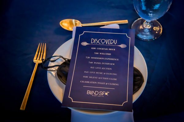 Image showing Discovery program on top of place setting.