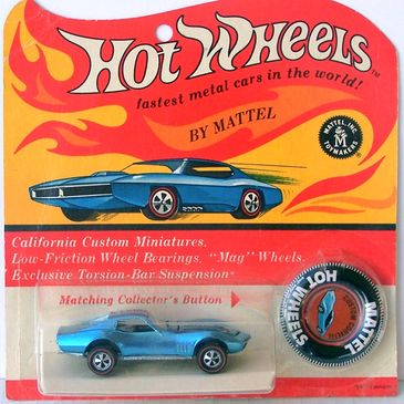 Vintage Hot Wheels blue muscle car toy in original packaging.