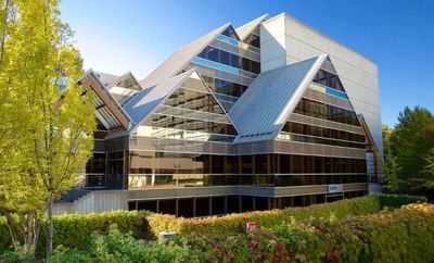 Photograph of Hult Civic Center in downtown Eugene, a shining cathedral of glass and native timber