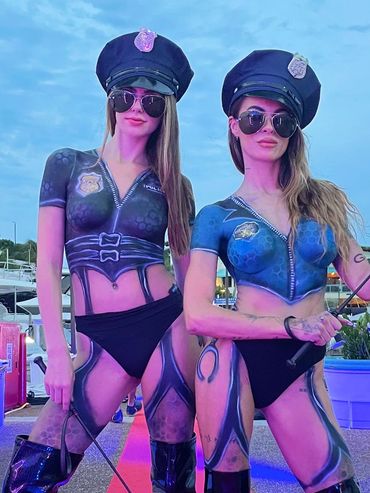 Women with Body painted police uniforms body art airbrush