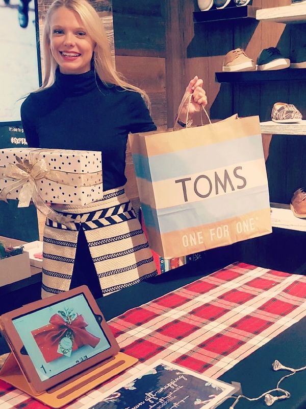 Annabelle wrapping at an on location event at TOMS 