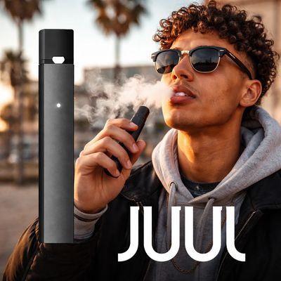 Lifestyle image of a JUUL device being used outside, highlighting a compact nicotine vape in Los Ang