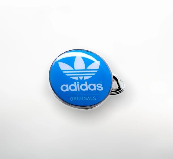 Adidas originals Nickel plated metal lapel badge. 24mm diameter