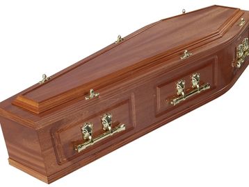 Closed wooden coffin with brass handles.