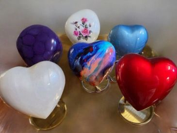 Colorful heart-shaped rings on display.