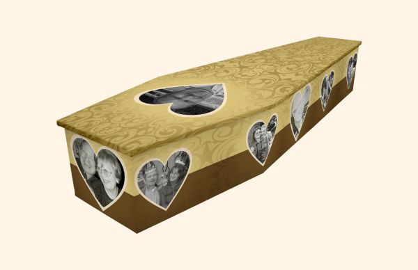 A decorated coffin with heart-shaped photo cutouts.