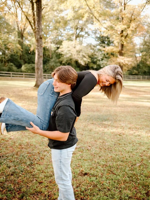 A joyful, lighthearted moment between the business owner and his loving girlfriend! 