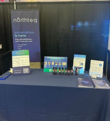 Trade show booth with banner, flyers, and more