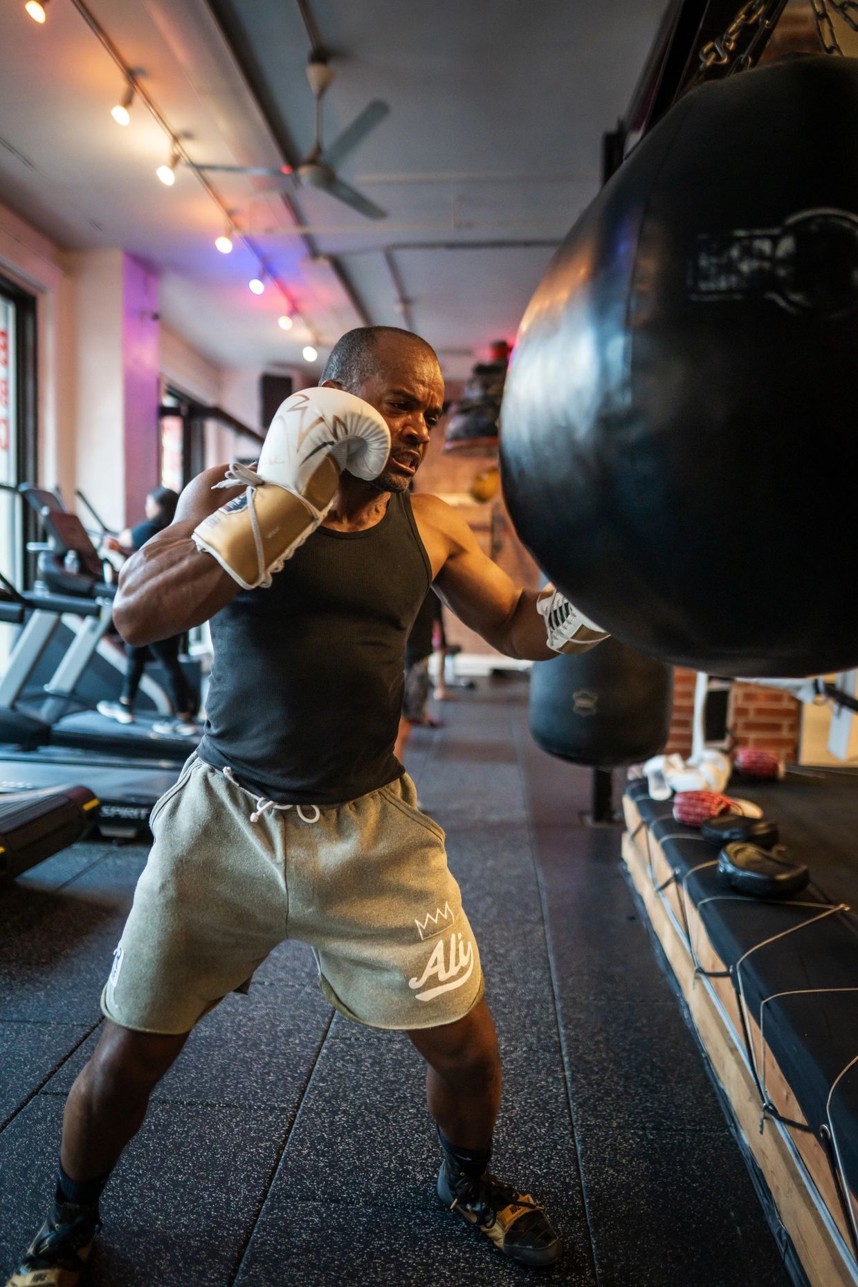 NYC boxing coach Ralph Gilmore training on heavy bag — Perennial Boxing + Fitness in Soho, Manhattan