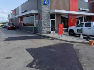 APM finished asphalt patch repair at McDonald's in Clairmont Alberta. Pothole repairs Grande Prairie